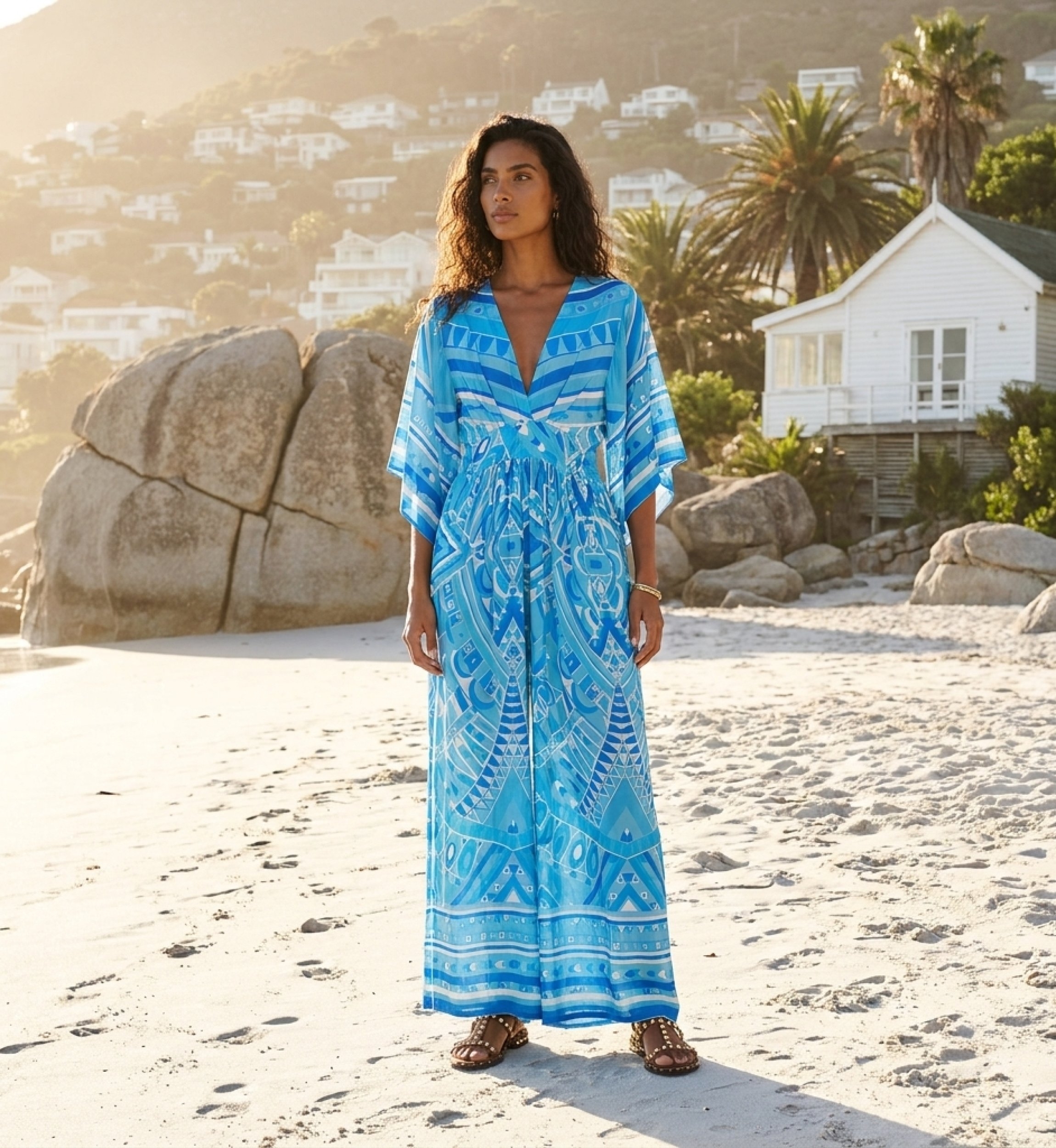 Macacão feminino azul, elegante macacão comprido com corte solto, ideal para verão casual, vista de corpo inteiro.