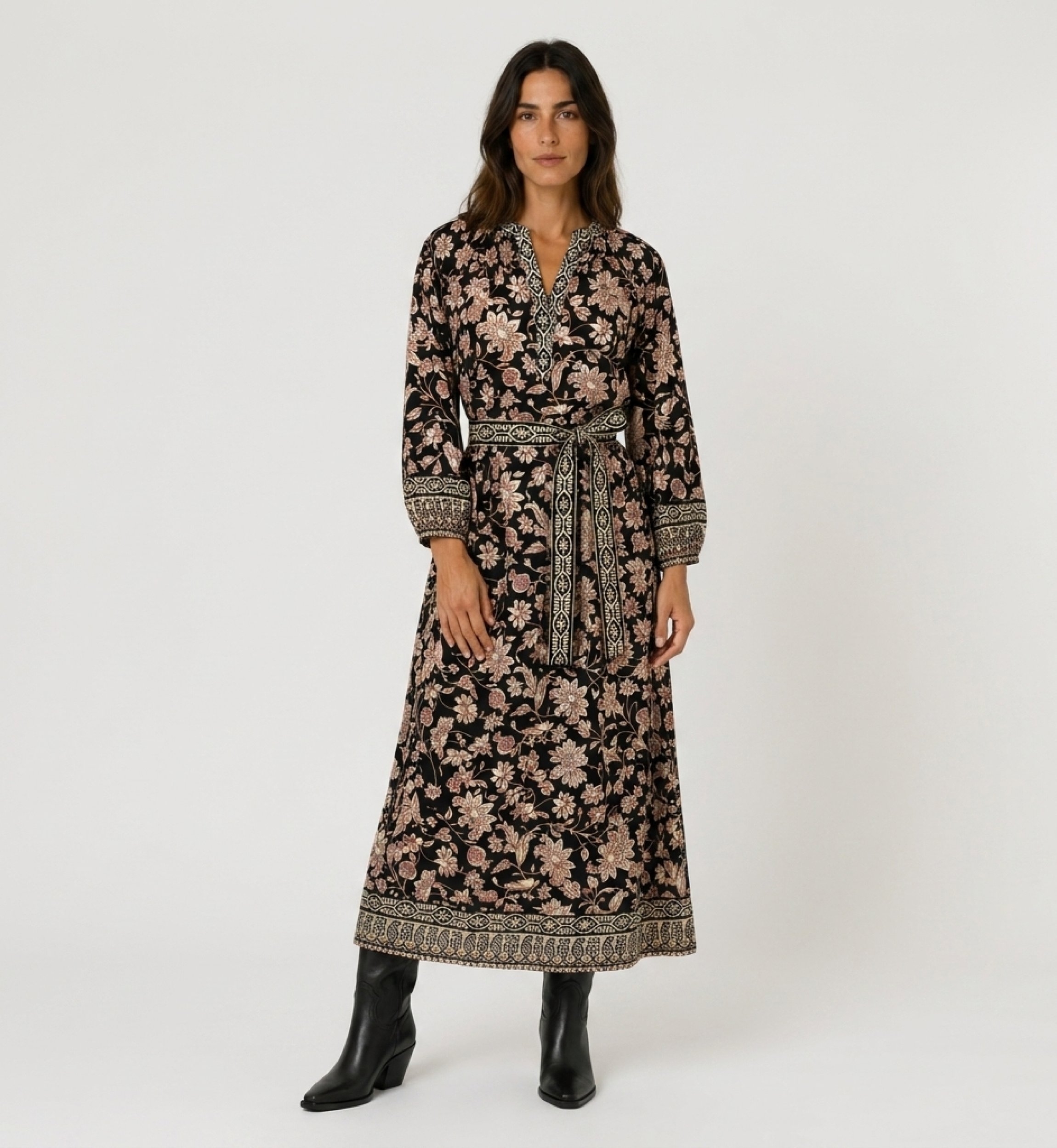 Front view of a black floral midi dress with beige and red pattern, V-neck, long balloon sleeves, and tie-waist belt.