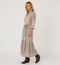 Brown and white striped midi dress with tiered skirt, white floral embroidery, and tie waist with tassels.