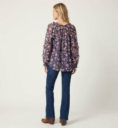 Dos blouse fluide bleu marine transparente, motif floral blanc et pêche, manches longues volantées, coupe ample.