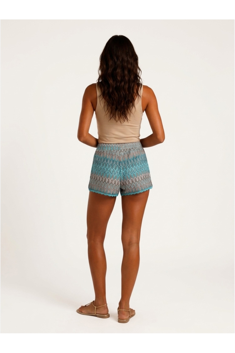Back view of women's casual summer shorts. Comfortable denim or cotton blend short pants, ideal for warm weather.