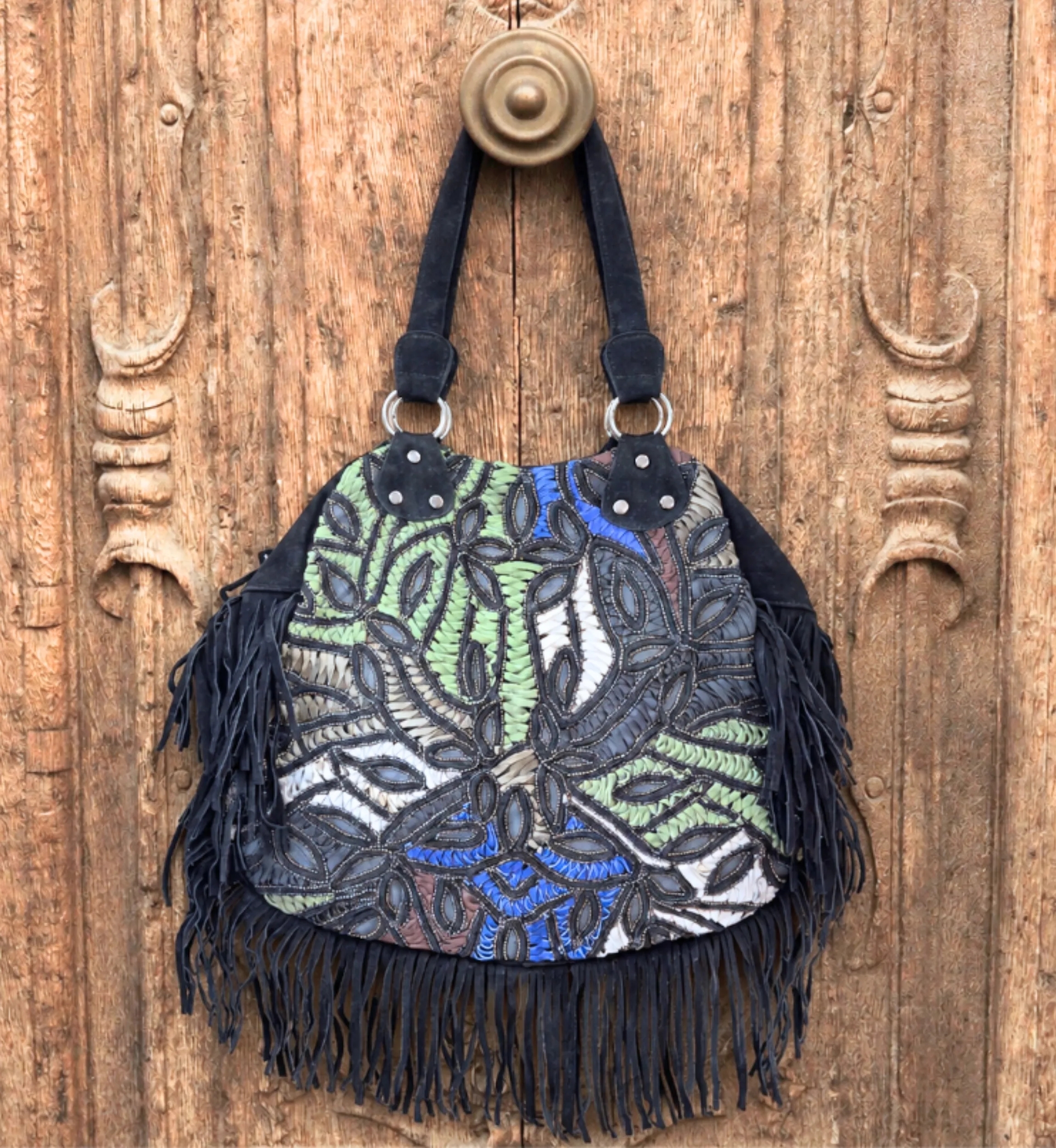 Black leather bag with long fringes | Miss June Paris